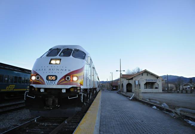 The locomotive of the south-bound 106 Rail Runner is seen as it waits to depart from Santa Fe, N.M. Wednesday, Jan. 14, 2009.