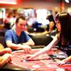 Players hope dealer Nikki Chang is good to them in the Hells Belles Party Pit inside of the Hard Rock Hotel and Casino in Las Vegas Thursday, July 21, 2011.