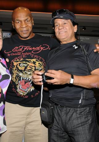 Boxing legends Mike Tyson and Roberto Duran attend the Friday Night Fights press conference at the Cosmopolitan on July 27, 2011.
