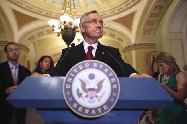 Senate Majority Leader Sen. Harry Reid of Nev. pauses during a news conference on Capitol Hill in Washington, Monday, Aug. 1, 2011, to talk about debt ceiling legislation.