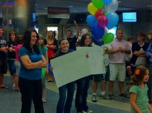 My fans greet me at Boise International Airport. Or maybe they were greeting the servicemen who walked out behind me ...