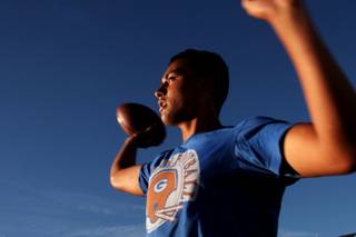 Bishop Gorman junior quarterback Anu Solomon, shown during practice Tuesday, August 16, 2011, is on track to shatter every significant Nevada passing record this season. He is one of 26 athletes on the preseason All-Sun team.