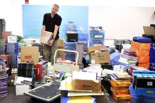 Principal Keith France tries to organize a room full of school materials in preparing for the first day of classes at Elizondo Elementary School in North Las Vegas on Tuesday, Aug. 23, 2011.