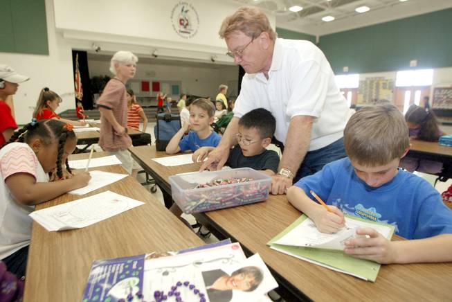 Cartwright Elementary students work on their homework during a SafeKey program after school on June 4, 2002.