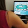 The state Gaming Control Board on Wednesday, Aug. 24, 2011, issued a draft of proposed regulations governing Internet poker. In this file photo, a woman who wished to remain anonymous plays online.