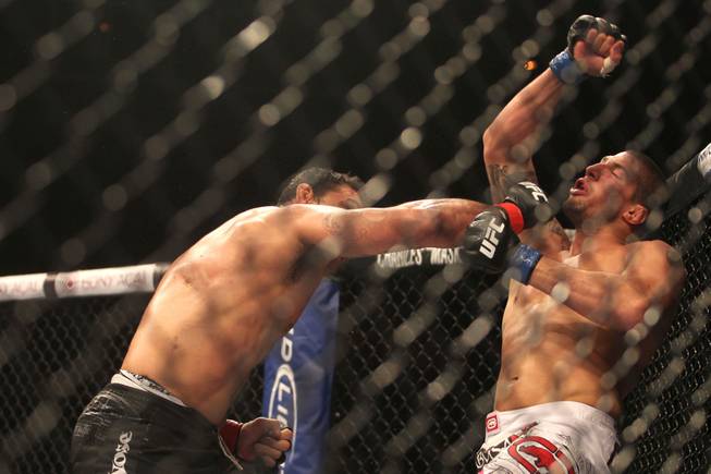 Antonio Rodrigo Nogueira knocks out Brendan Schaub in the first round of their heavyweight bout at UFC 134 in Rio de Janeiro. 