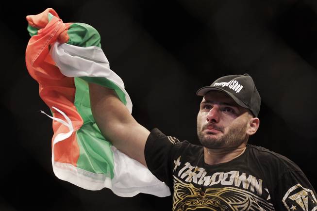 Stanislav Nedkov waves the Bulgarian flag after beating Luiz Cane via first round knockout at UFC 134 in Rio de Janeiro. Nedkov was the only foreigner to beat a Brazilian on the card.