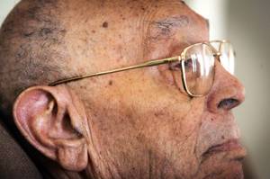 Wilbur Brewer inside his Las Vegas home Tuesday, Aug. 30, 2011. As a young G.I. during WWII, Wilbur helped carry a young Willy Huys to safety after the Germans bombed her village in Holland.