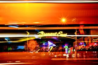 A bus passes on Las Vegas Boulevard as the Fremont East District is seen Wednesday, August 31, 2011.