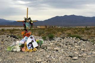 A memorial for 15-year-old Alyssa Otremba is shown near Grand Teton Drive and Tee Pee Lane Monday, September 5, 2011. 