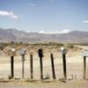 Rows of mailboxes line Nevada 373, near Mecca Road, in Amargosa Valley. A new report finds that rural roads in Nevada are twice as deadly as those in urban areas.