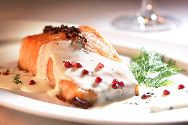 Salmon peppercorn crusted with dill beurre blanc at Embers Steakhouse ...