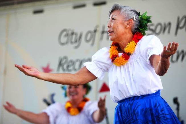 Members of the Na Hula Hali'a dance group perform during the 21st Ho'olaule'a Pacific Islands Festival in downtown Henderson Saturday, Sept. 10, 2011.