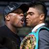Undefeated boxer Floyd Mayweather Jr. and WBC welterweight champion Victor Ortiz face off during a news conference at the MGM Grand Wednesday, September 14, 2011. Mayweather will challenge Ortiz for the title at the MGM Grand Garden Arena on Saturday.