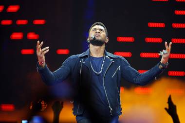 Usher performs with David Guetta (not pictured) during the second night of the iHeartRadio Music Festival at MGM Grand Garden Arena on Saturday, Sept. 24, 2011. The festival marks the official launch of iHeartRadio, Clear Channel’s free digital radio product combining more than 800 broadcast radio and digital-only stations from 150 cities.