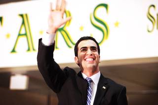 Ruben Kihuen waves to the crowd during his campaign kickoff celebration at Rancho High School in Las Vegas on Tuesday, Sept. 27, 2011. Kihuen, who is a state senator, is running for Congress in 2012.