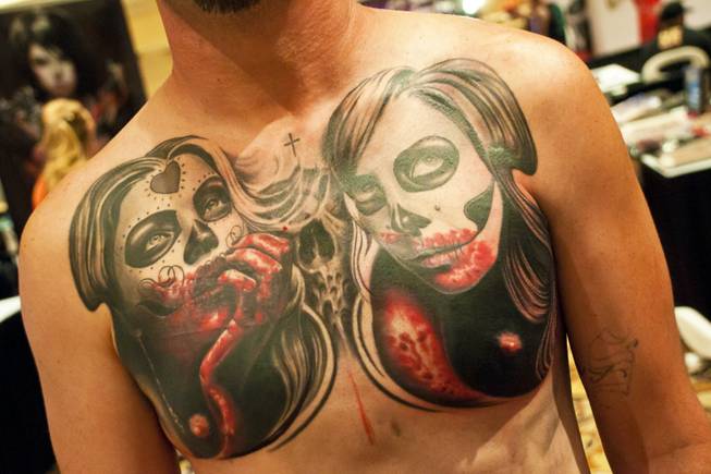 2011 Biggest Tattoo Show On Earth: Friday - Jessie Garcia of Las Vegas  shows off a fresh tattoo ... -