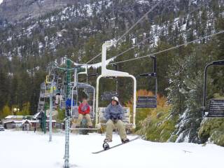 Snowboarders and skiiers hit the slopes as the Las Vegas Ski & Snowboard Resort opens Saturday, Oct. 8, 2011.