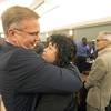 Anne Arnold is hugged by her attorney Robert Eglet after a jury on Monday, Oct. 10, 2011, ordered three pharmaceutical companies to pay $162.5 million in punitive damages to plaintiffs in a lawsuit that accused them of negligently distributing large vials of an anesthetic to Las Vegas clinics at the center of a 2008 hepatitis C outbreak. 