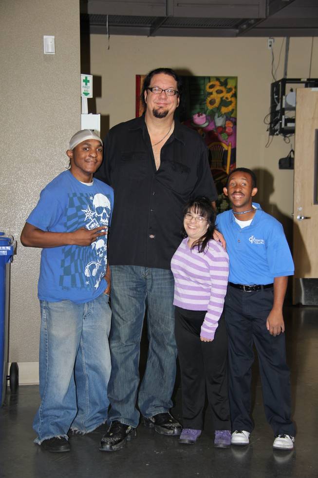 After advancing to another round on "Celebrity Apprentice," Penn Jillette visits Opportunity Village to deliver a check worth $40,000 earned from his wins on the show.