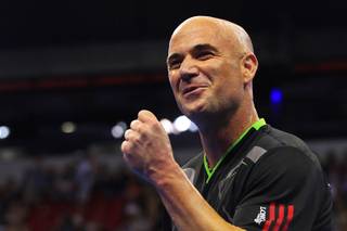 Andre Agassi celebrates a point during the Las Vegas stop of the 2011 Champions Series Tennis tournament Saturday, Oct. 15, 2011.