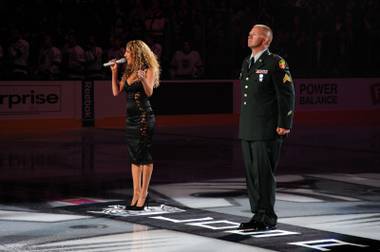 Lorena Peril sings the national anthem at the L.A. Kings game at Staples Center on Oct. 19, 2011.