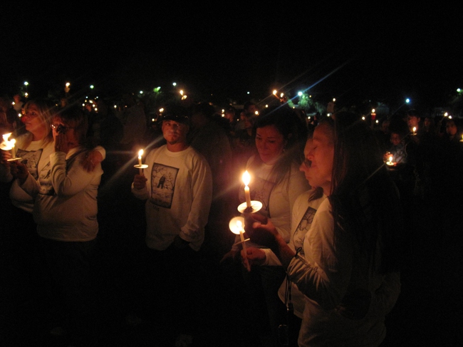 Lani Smith (right) and dozens of people gathered Friday night at a candlelight vigil for three girls who were struck by a car Oct. 21 in a North Las Vegas crosswalk on Camino Eldorado, near Tropical Parkway. Smith is the aunt of six-year-old Mia Decker, who died from injuries caused by the accident accident. Two other girls who are sisters, 5-year-old Alyssa and 6-year-old Rain Mowrey, were injured.