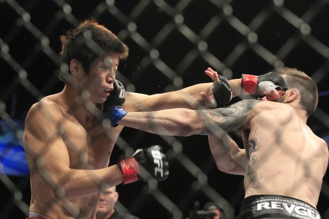 George Roop lands a left to the head of Hatsu Hioki during their bout at UFC 137 Saturday, Oct. 29, 2011 at the Mandalay Bay Events Center. Hioki won by split decision.
