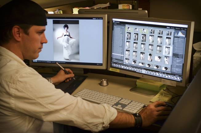 Las Vegas Magazine art director Erik Stein reviews all 1,300 images from the Terry Fator and Taylor Makakoa photoshoot. Only two images will make the final cut for the poster creation.
