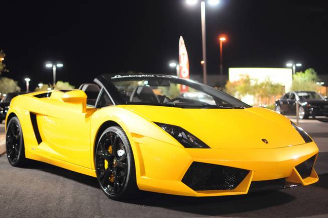 Lamborghini Las Vegas in Henderson opens a new showroom and unveils the brand's newest model, the Aventador LP 700-4. About 100 Lamborghini owners, admirers and their friends attended the Thursday evening event, Nov. 10, 2011.