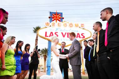 Ashley Hankinson and Jeremy Hankinson of Brantford, Ontario, wed at the Welcome to Fabulous Las Vegas sign on Friday, Nov. 11,&nbsp;2011.