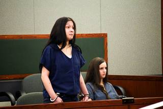Bridget Lugo stands during her court appearance at the Regional Justice Center Thursday, Nov. 17, 2011. Lugo is one of the six people charged with the murder of Eldorado High School teacher Timothy VanDerbosch.