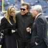 New England Patriots owner Robert Kraft, right, hosts casino mogul Steve Wynn and his wife, Andrea Hissom, on the field at Gillette Stadium prior to the Patriots' NFL football game against the Indianapolis Colts in Foxborough, Mass., Sunday, Dec. 4, 2011.