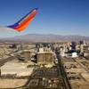 Las Vegas Strip casinos are viewed from the window of a Southwest Airlines passenger jet as it takes off from McCarran International Airport on Dec. 9, 2011.