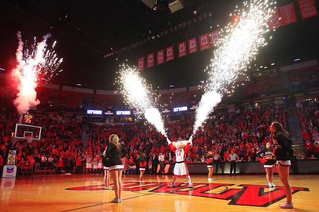 UNLV mascot Hey Reb shoots off fireworks before the start ...