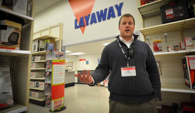 Kmart store manager Ted Straub talks Thursday Dec. 15, 2011, in his Omaha, Neb., store. Dozens of Kmart customers across the country have had their layaways paid off by strangers. 