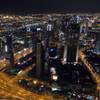 A view of Dubai's city center is shown from the Burj Khalifa's observation tower.