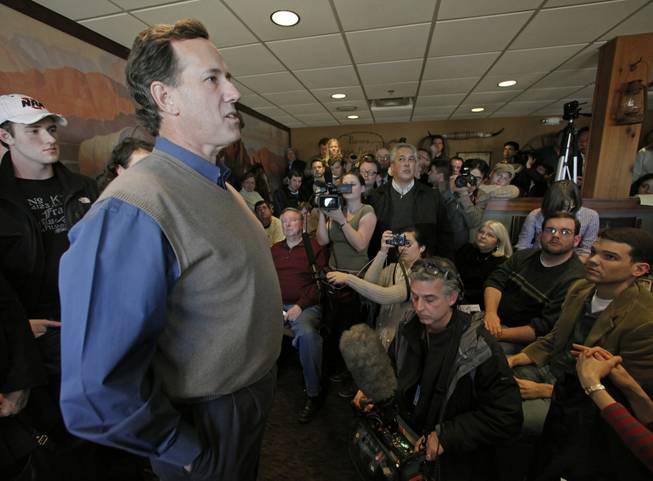 Republican presidential candidate former Pennsylvania Sen. Rick Santorum speaks at a campaign stop at Pizza Ranch in Boone, Iowa, Monday, Jan. 2, 2012.