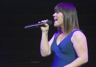 Singer Kelly Clarkson performs during a Sony news conference at the Las Vegas Convention Center on Jan. 9, 2012.