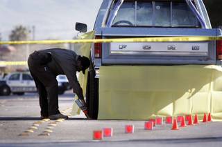 Metro investigates a fatality after a pedestrian was hit by a pickup truck near Eastern and Cedar avenues and died at the scene Tuesday, Jan. 10, 2012.