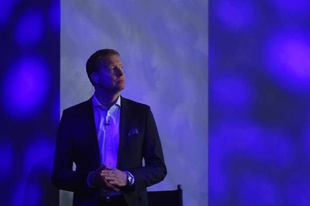 Hans Vestberg, president and CEO of the Ericsson Group, watches a video during his keynote address at the 2012 International Consumer Electronics Show (CES) in Las Vegas, Nevada, Jan. 11, 2012. CES, the world's largest consumer technology tradeshow, runs through Friday.