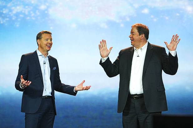 Hans Vestberg (L), president and CEO of the Ericsson Group, is joined by Mike White, president of Maersk Line Inc, during a keynote address during the 2012 International Consumer Electronics Show (CES) in Las Vegas, Nevada, Jan. 11, 2012. Vesberg announced a collaboration with Maersk Line, the world's largest shipping company, that will create the world's largest floating network.