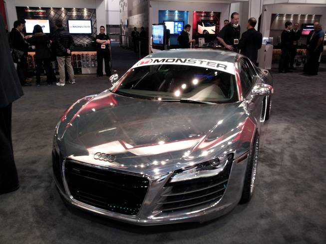 Exhibitors at the 2012 CES often use cars to showcase products.  In some cases, the car is the product.  These cars are scattered across the exhibit floor, but they all have one thing in common, Luxury.