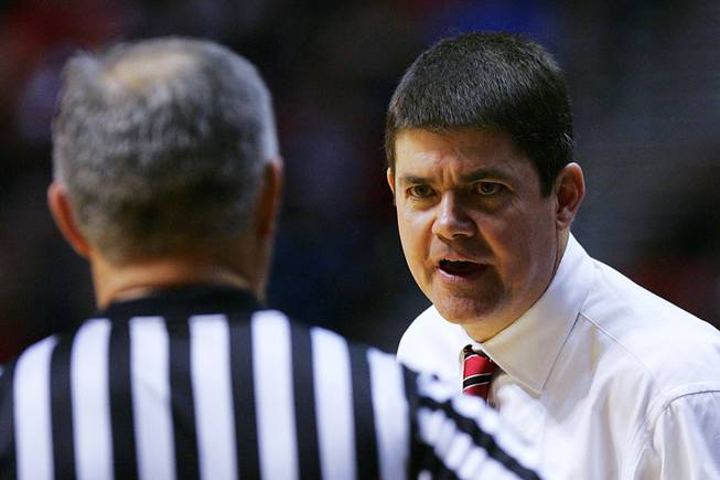 UNLV head coach Dave Rice talks to an official during their game against San Diego State Saturday, Jan. 14, 2012 at Viejas Arena in San Diego. San Diego State won the Mountain West Conference opener 69-67.