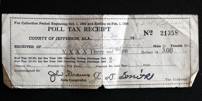 A poll tax receipt from 1964 in Alabama belonging to current Las Vegas resident Lola Mae Davis. Photographed on Friday, Jan. 13, 2012.