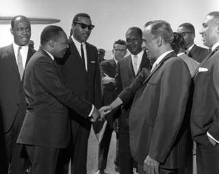 Martin Luther King Jr. greets people at the airport during his only visit to Las Vegas in April 1964.
