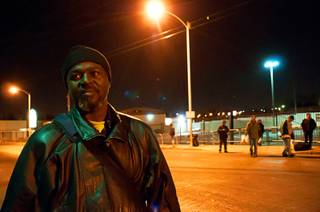 Anthony Smith, a Las Vegas resident, waits outside a homeless shelter hoping to get a place to sleep for the night Wednesday, Jan. 18, 2012.