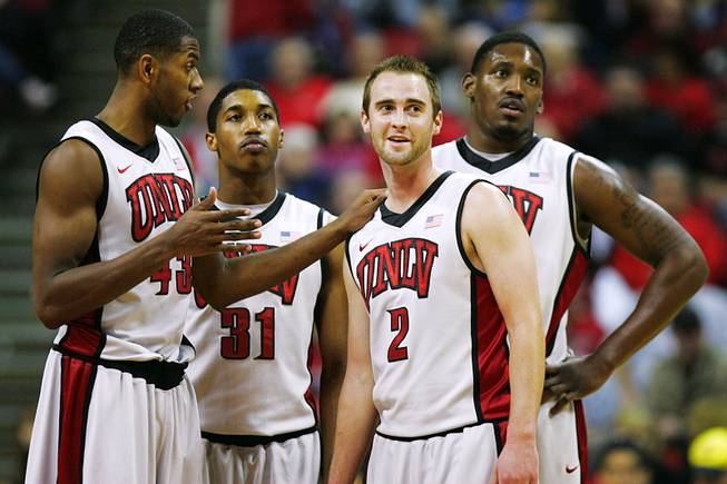 UNLV players, from left, Mike Moser, Justin Hawkins, Kendall Wallace and Quintrell Thomas wait for Anthony Marshall to shoot free throws after a flagrant foul by TCU during their Mountain West Conference game Wednesday, Jan. 18, 2012 at the Thomas & Mack Center. UNLV won the game 101-78.