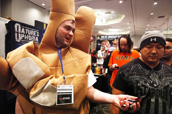 A man, dressed as "The Shocker," does marketing at the AVN Adult Entertainment Expo 2012 inside the Hard Rock Hotel on Thursday, Jan. 19, 2012.