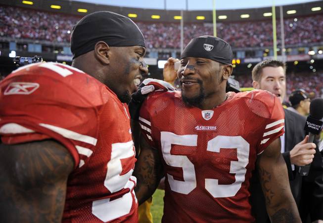 San Francisco 49ers linebackers Patrick Willis, left, and NaVorro Bowman, right, celebrate after defeating the New Orleans Saints 36-32 to advance to the NFC Championship Game.